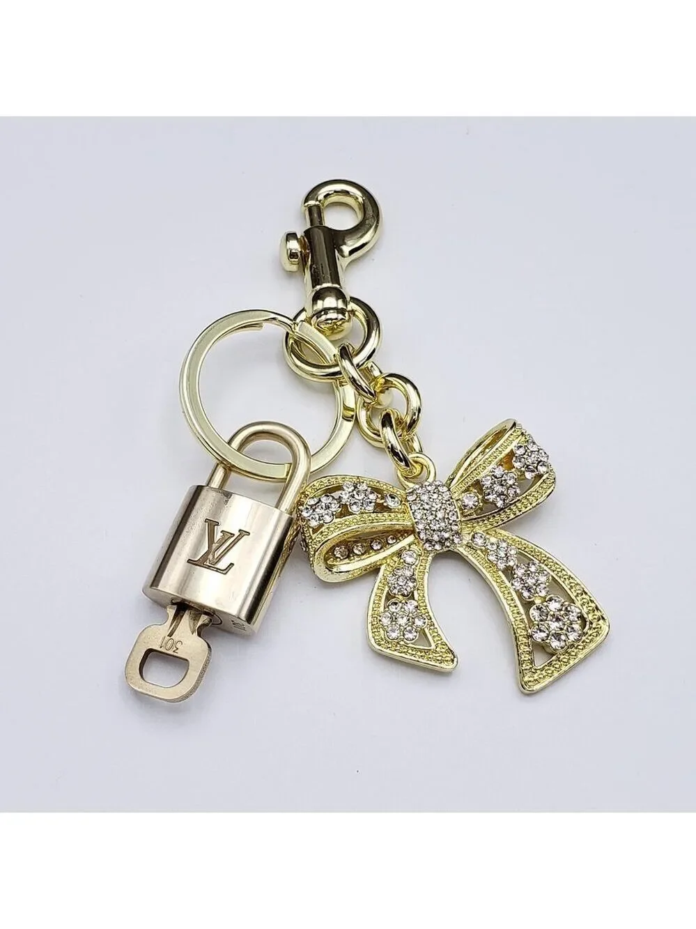 Authentic Louis Vuitton Lock & Key with Unbranded Ribbon Charm, Keychain